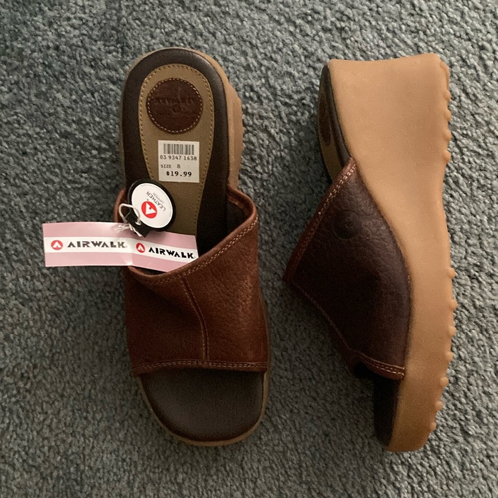 Size 8 upper leather sandal never been worn